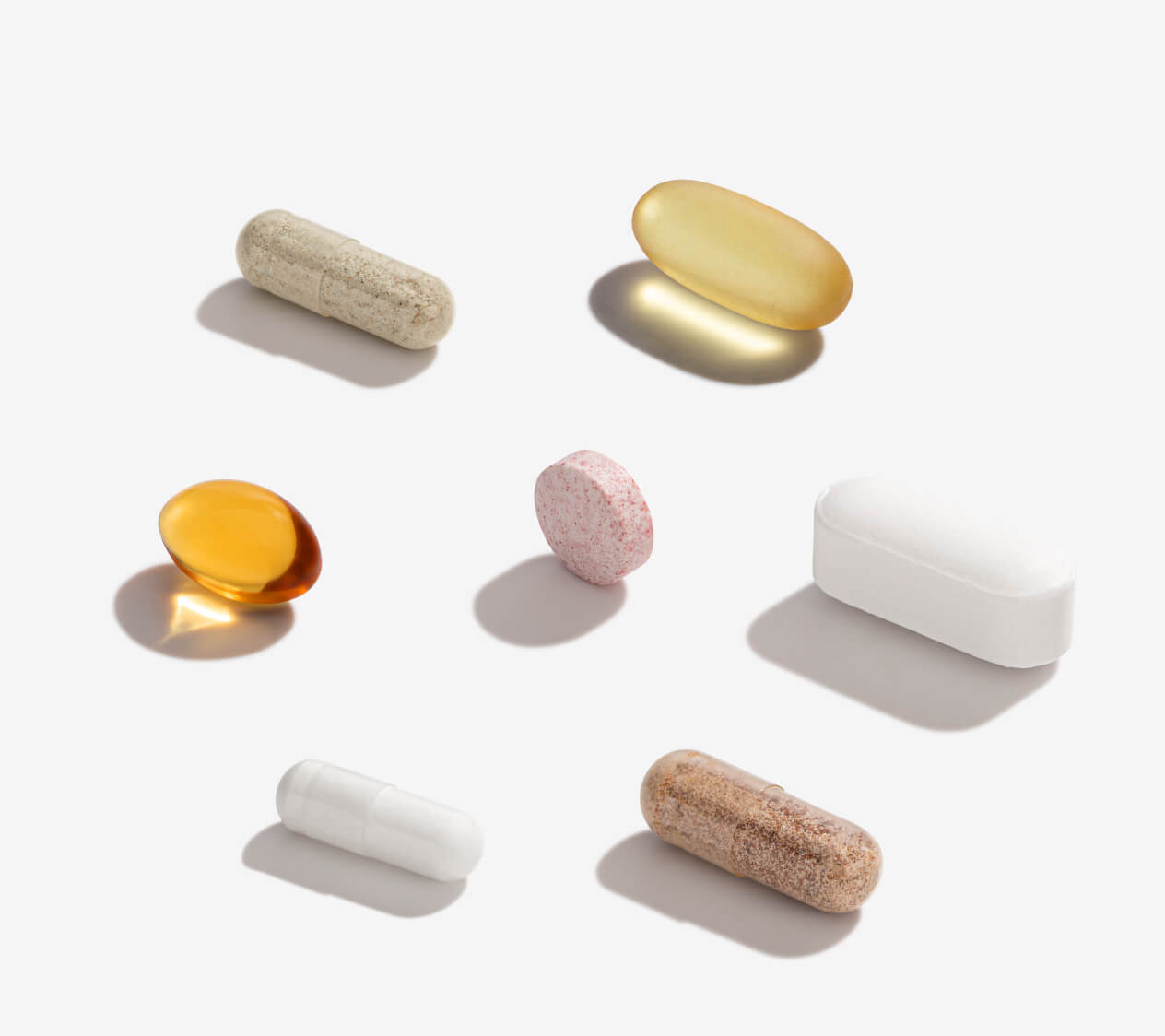 7 supplements lined up on a light background 